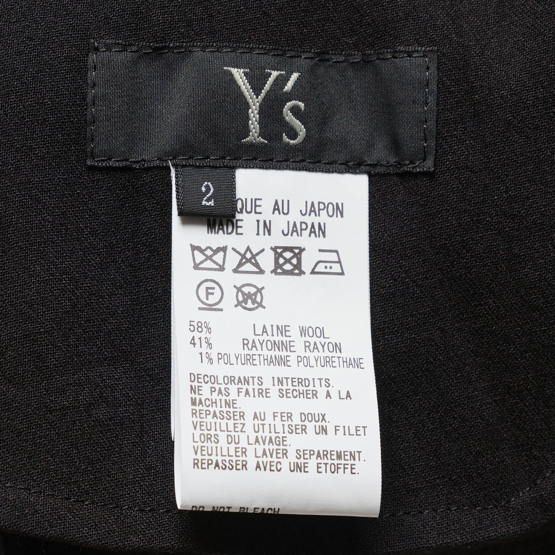 Y's black structured cloth maxi skirt with asymmetric hem, patch pocket, and tailored waistband with button fastening - view 3