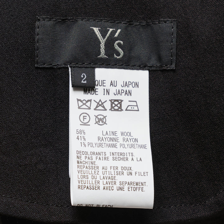 Y's black structured cloth maxi skirt with asymmetric hem, patch pocket, and tailored waistband with button fastening - view 3