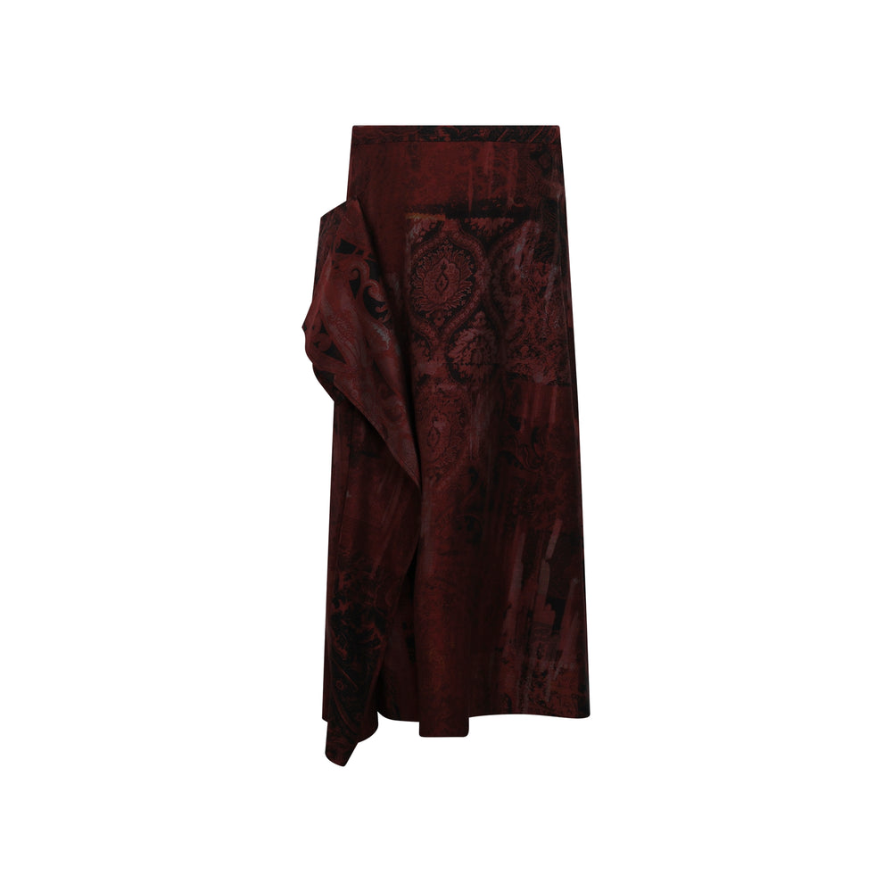 Y's deep crimson and black jacquard midi skirt with asymmetric draped panel at the hip, displayed flat against a white background - view 2