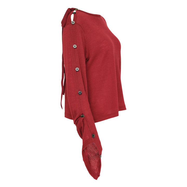 Y's red lightweight knit boat neck top with dark gunmetal buttons running along the full length of both long sleeves, shown flat on a white background - view 3