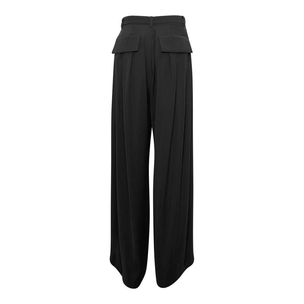 sacai Crepe Back Satin Pants in black — wide-leg high-waist silhouette with attached self-fabric belt and silver-toned buckle, shown on a plain white background - view 2