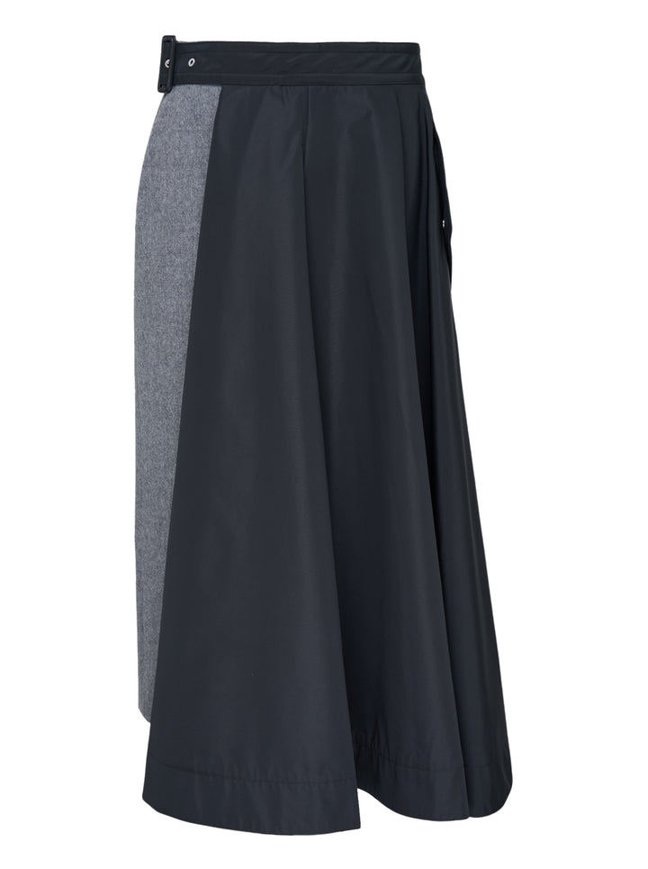 sacai Wool Flannel x Taffeta Bonding midi skirt in navy and grey with asymmetric contrast panel and belted waistband