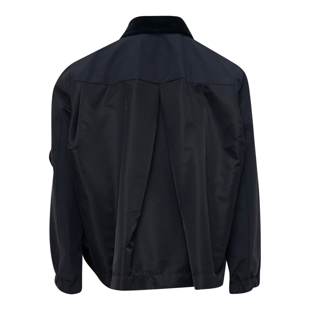 sacai Grosgrain Bonding Blouson in black, featuring a velvet collar, chest zip pockets, oversized cargo pockets, and a sleeve zip pocket with silver-tone hardware - view 2