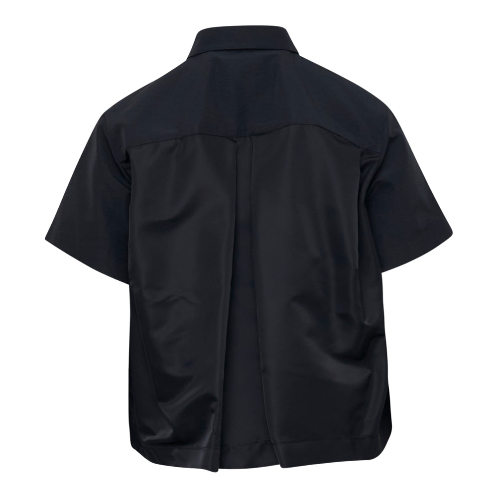 sacai Grosgrain Bonding x Nylon Twill short sleeve shirt in dark navy, featuring a boxy silhouette, dual oversized chest flap pockets, and a button-front closure with tonal buttons - view 2