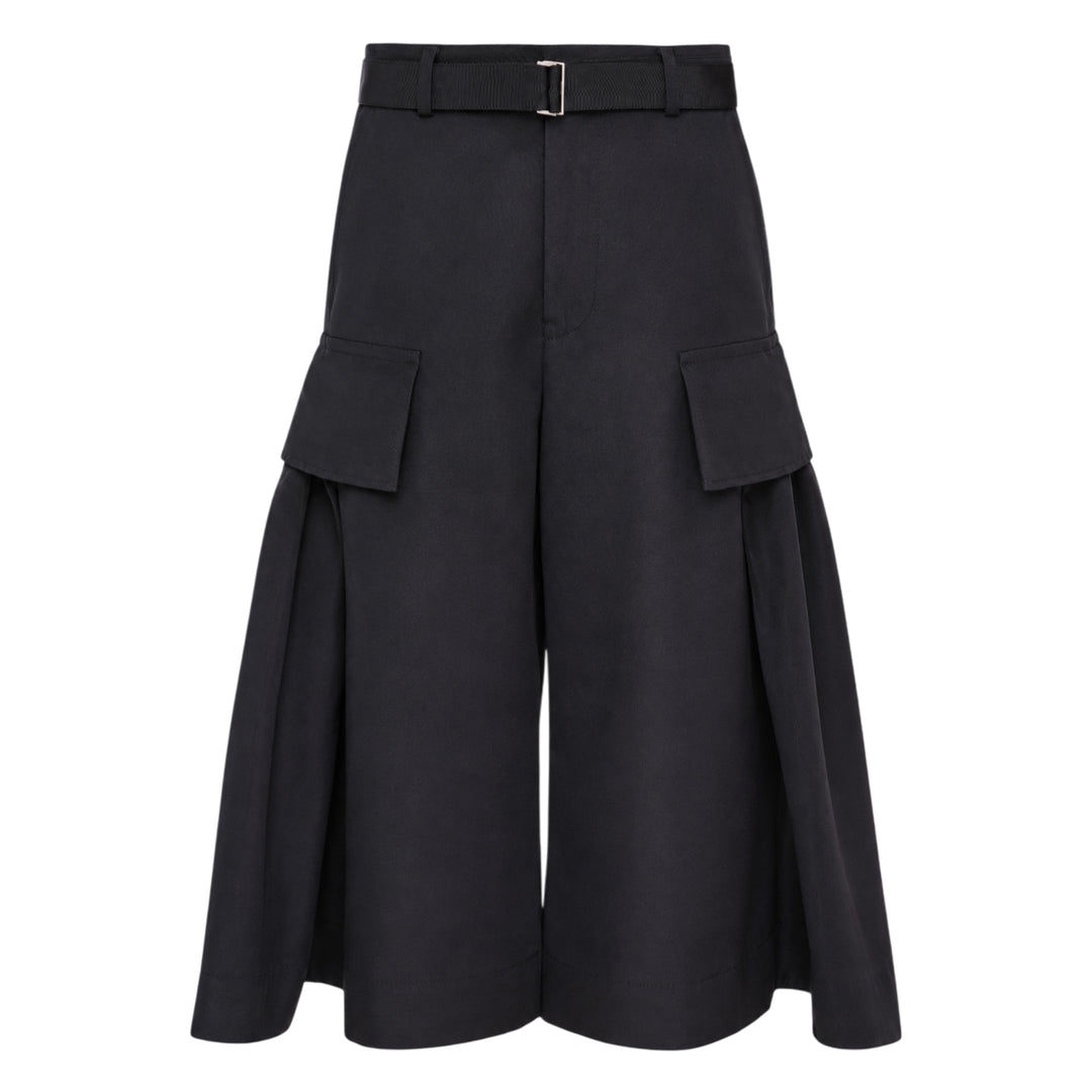 sacai Grosgrain Belted Wide-Leg Pants in black — high-waist pleated culottes with cargo patch pockets and integrated grosgrain belt, front view