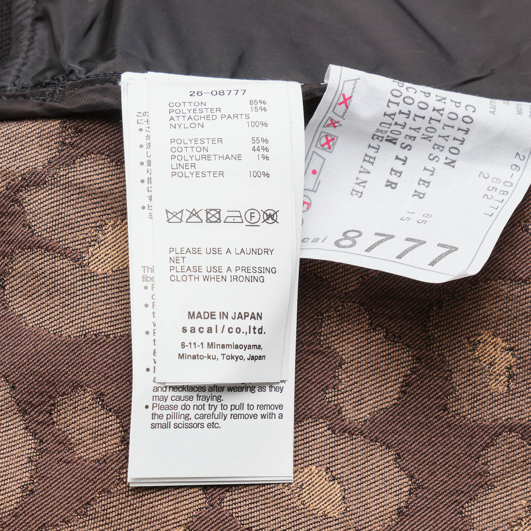 sacai Leopard x Nylon Twill Jacket in brown and black leopard print with snap button front, dual chest pockets, and MA-1 zip detail on sleeve - view 3