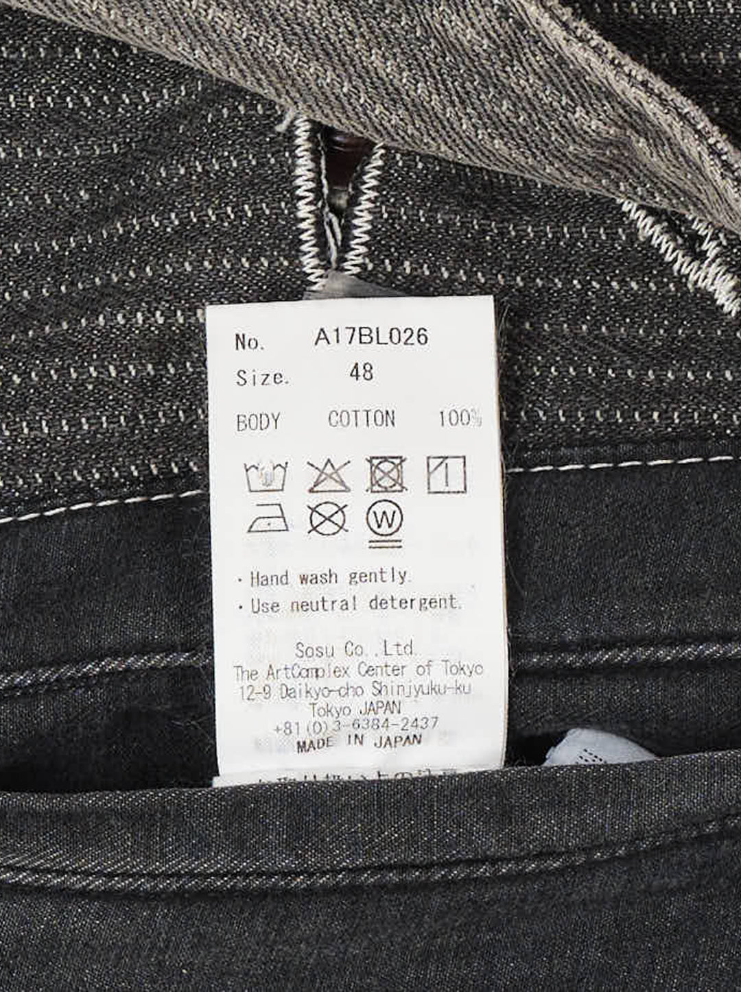 Faded grey pinstripe denim chore jacket with distressed detailing, paint splatter, patchwork pockets and oversized metal buttons - view 3