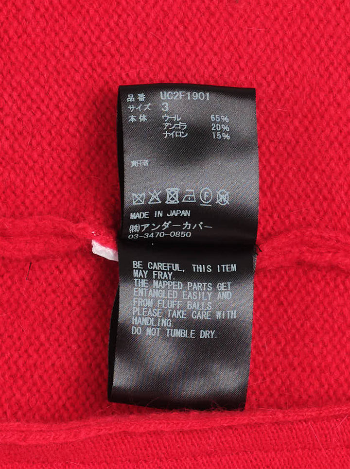 Undercover asymmetrical red wool knit cardigan with ribbed funnel collar, graduated pearlescent buttons and patch pockets - view 3