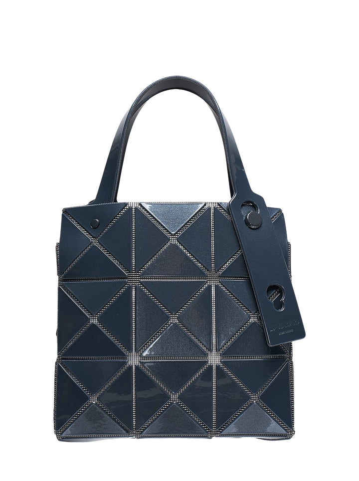Bao Bao Issey Miyake Carat Small Top Handle bag in midnight navy with geometric triangular prism panels outlined in metallic silver ribbing and a single structured top handle