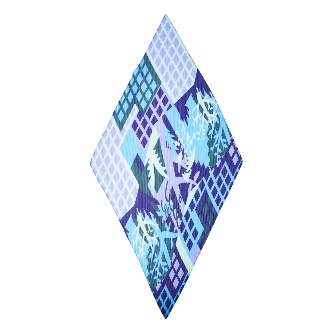 me Issey Miyake Building Pleats Stole in diamond silhouette featuring a tonal blue and violet geometric lattice pattern with botanical motifs and signature pleat construction