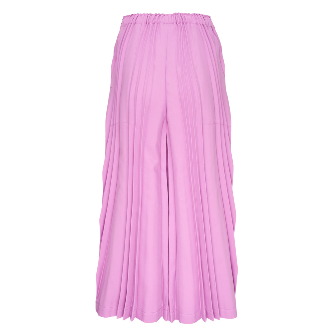 me Issey Miyake Tower Pleats Bottom in black — wide-leg cropped pants with deep vertical pleating and elasticated waistband, shown flat on white background