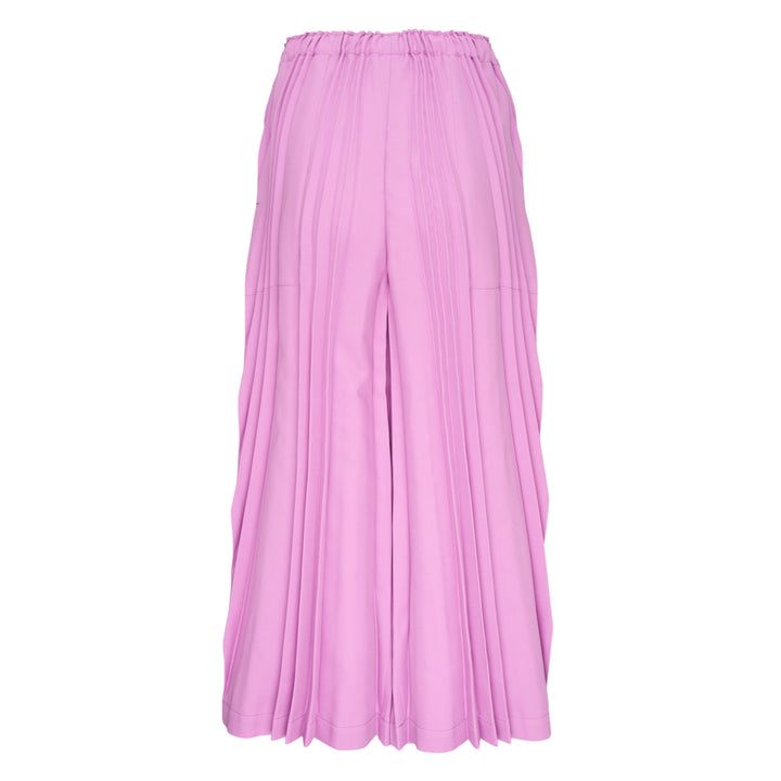 me Issey Miyake Tower Pleats Bottom in black — wide-leg cropped pants with deep vertical pleating and elasticated waistband, shown flat on white background