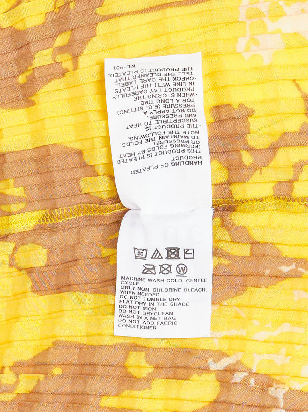 me Issey Miyake Leaf Pleats long sleeve crew neck top in yellow with tan and cream abstract print, shown flat against a white background - view 3