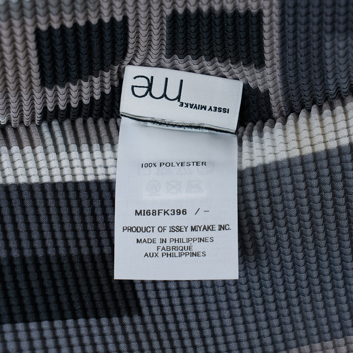me Issey Miyake Building Short Sleeve Pleated Top with allover monochromatic cityscape and botanical graphic print