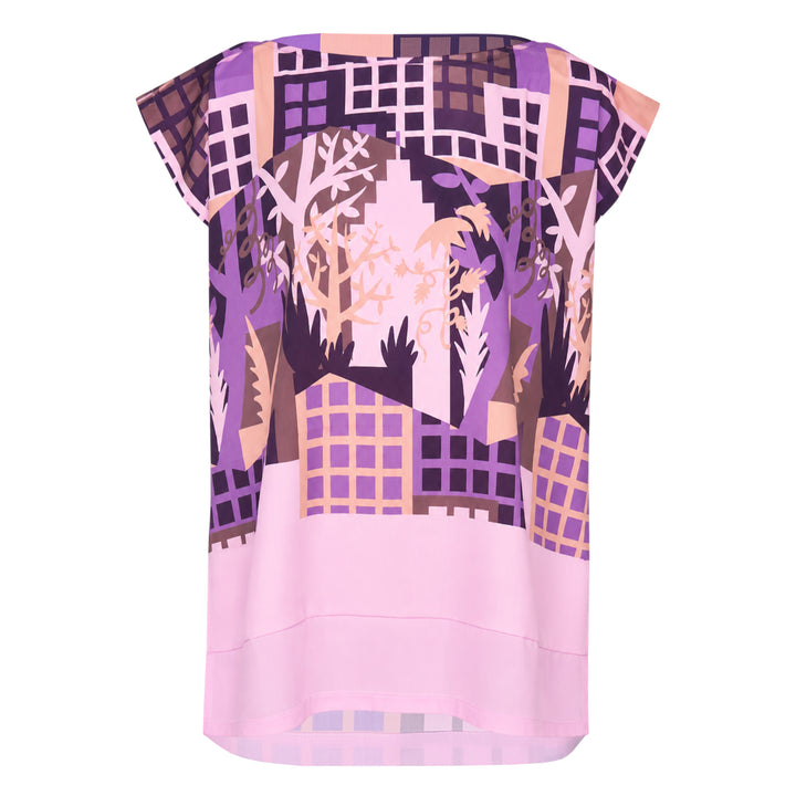 me Issey Miyake Building Print Cap Sleeve Top featuring an all-over graphic print of silhouetted urban buildings and botanical foliage in black, white, and muted violet-grey, shown from the front against a white background