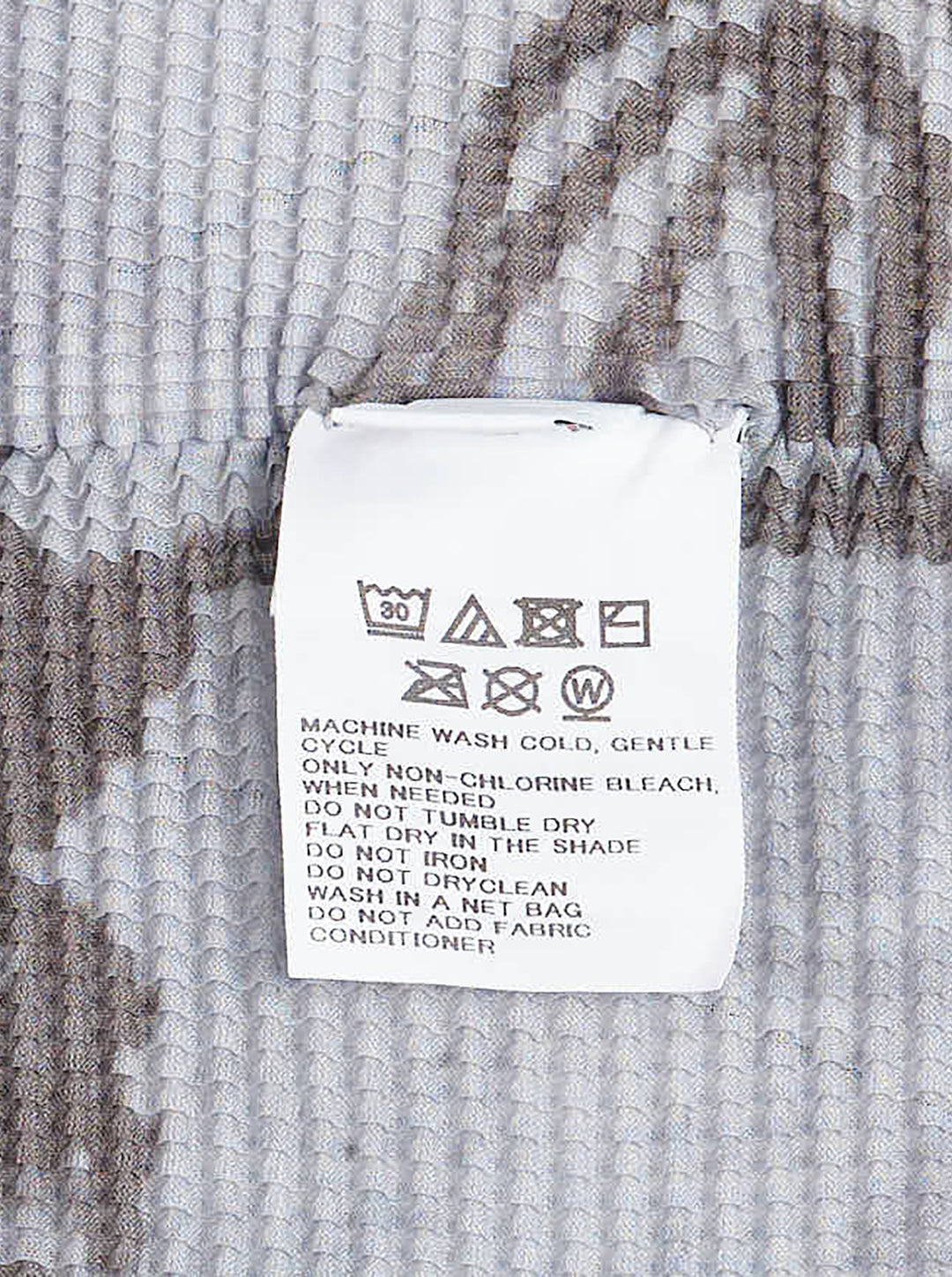 me Issey Miyake PLANT Short Sleeve Pleated Top in lavender with all-over botanical and geometric print, featuring a turtleneck collar and short puff sleeves - view 3
