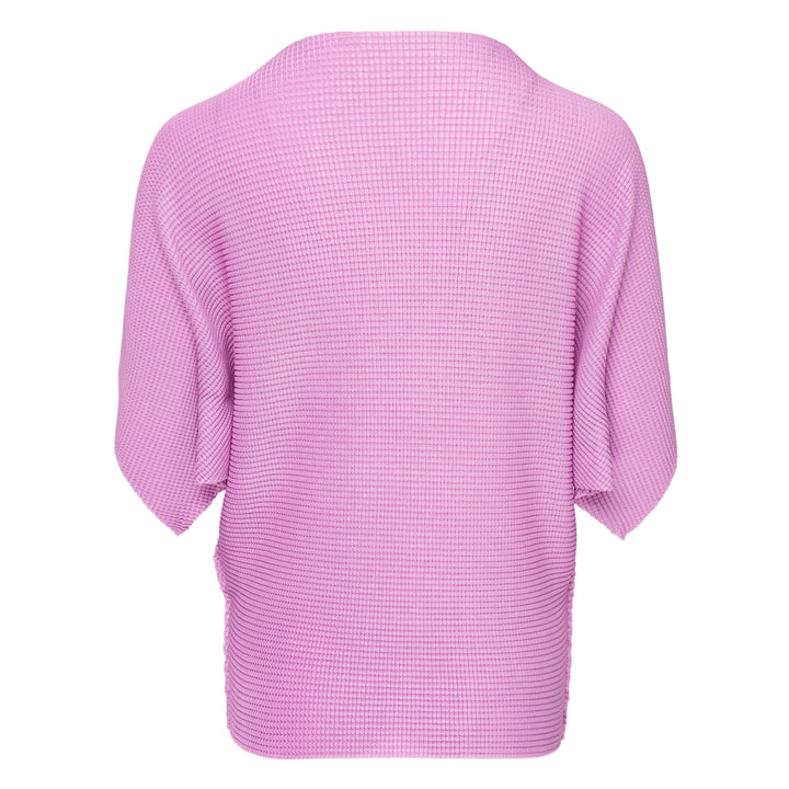 me Issey Miyake Tower Knit Stretch Pleats top in black, shown from the back, featuring a structured waffle-knit pleated fabric, oversized batwing sleeves with raw edges, and a rounded crew neckline