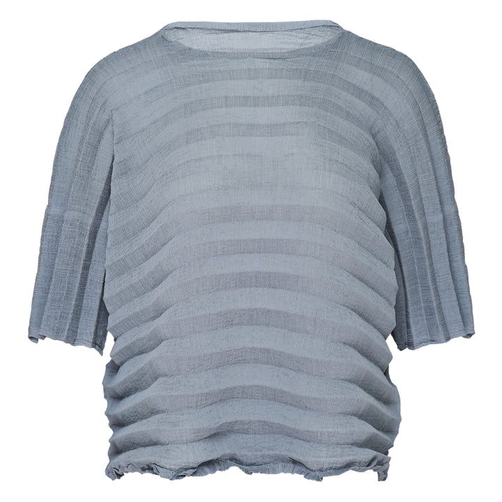 me Issey Miyake Accordion See-Through Crepe top in dusty blue, featuring horizontal accordion pleating, oversized boxy silhouette, elbow-length sleeves, and a gathered ruched hem, photographed flat on a white background