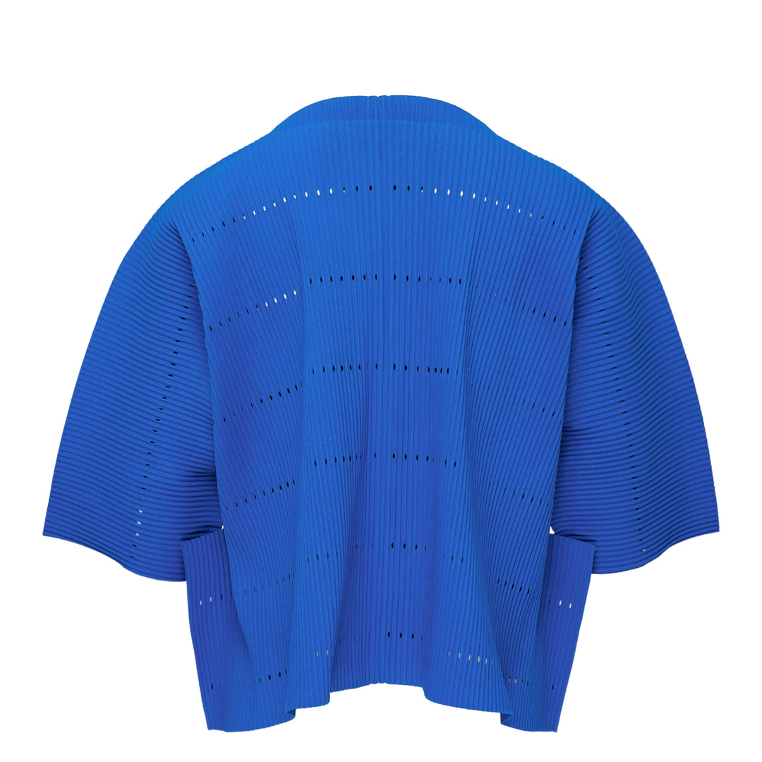 me Issey Miyake Tower Pleats Cardigan in cobalt blue, back view, featuring radiating openwork cutouts, tonal buttons, patch hip pockets, and cropped elbow-length sleeves