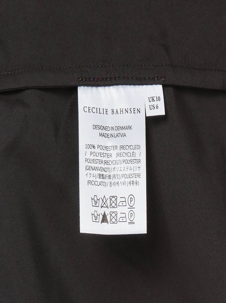 Cecilie Bahnsen Recycled Faille Midi Dress in deep espresso brown, sleeveless with a round neckline, relaxed cocoon silhouette, and curved hem, shown on a white background - view 3