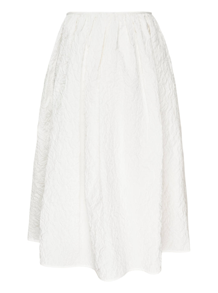 Cecilie Bahnsen Floratini Matelassé Midi Skirt in white, displayed flat, showing a voluminous A-line silhouette with an all-over raised jacquard texture and elasticated waistband - view 2