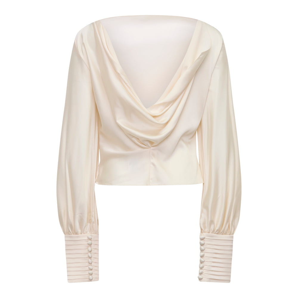 Stolen Stores Kaia Blouse in ivory satin with voluminous balloon sleeves and structured pleated cuffs, displayed flat on a white background - view 2