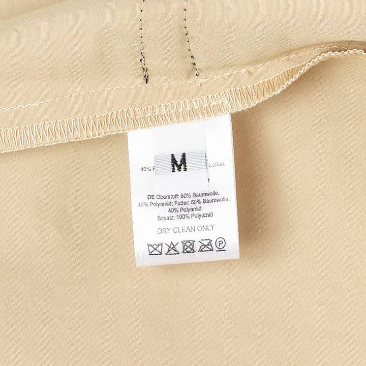 Hisu Park Nylon Cotton Waves Shorts in khaki and black, featuring allover gathered bubble smocking and an elasticated drawstring waistband, displayed flat on a white background - view 6