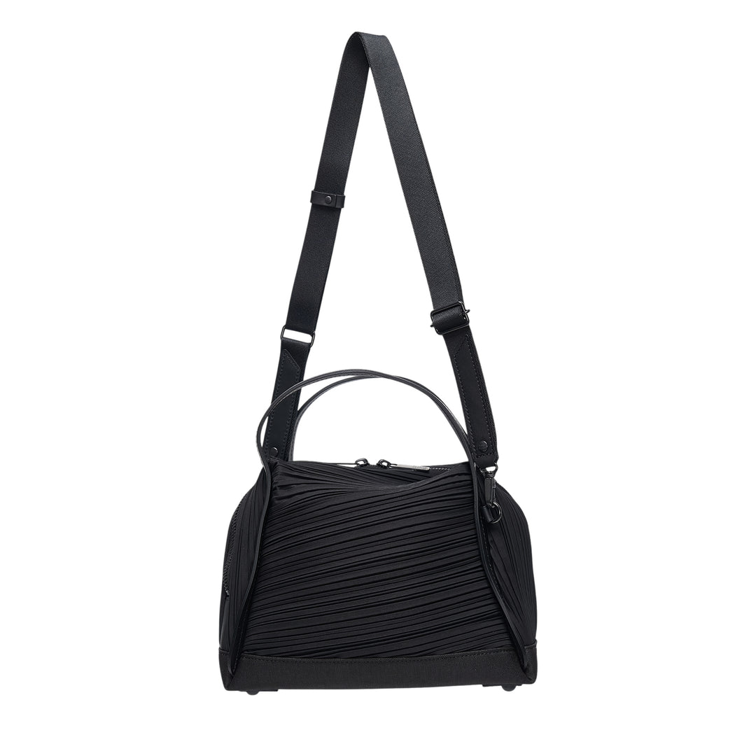 Pleats Please Issey Miyake Bias Pleats Crossbody Bag in black, showing diagonal pleated fabric body, dual top handles, and adjustable webbing shoulder strap on white background