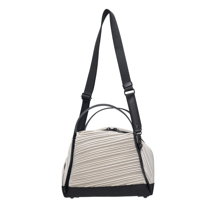 Pleats Please Issey Miyake Bias Pleats Crossbody Bag in black, showing diagonal pleated fabric body, dual top handles, and adjustable webbing shoulder strap on white background