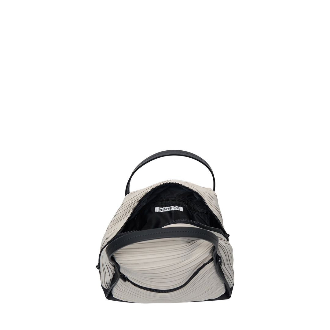 Pleats Please Issey Miyake Bias Pleats Crossbody Bag in black, showing diagonal pleated fabric body, dual top handles, and adjustable webbing shoulder strap on white background