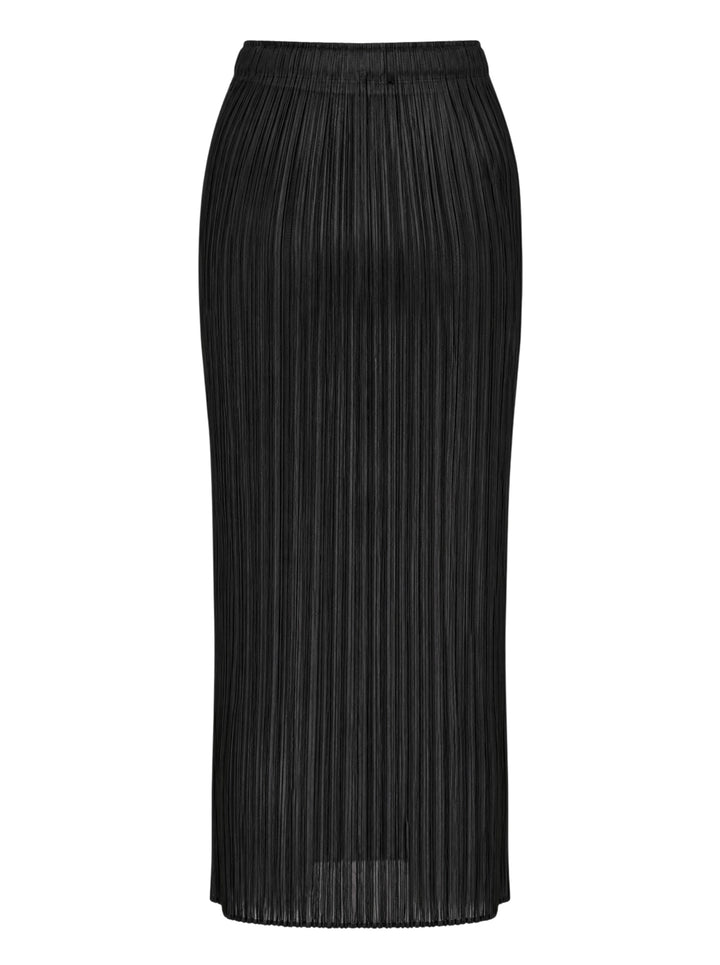 Back view of a black micro-pleated midi skirt by Pleats Please Issey Miyake with an elasticated waistband