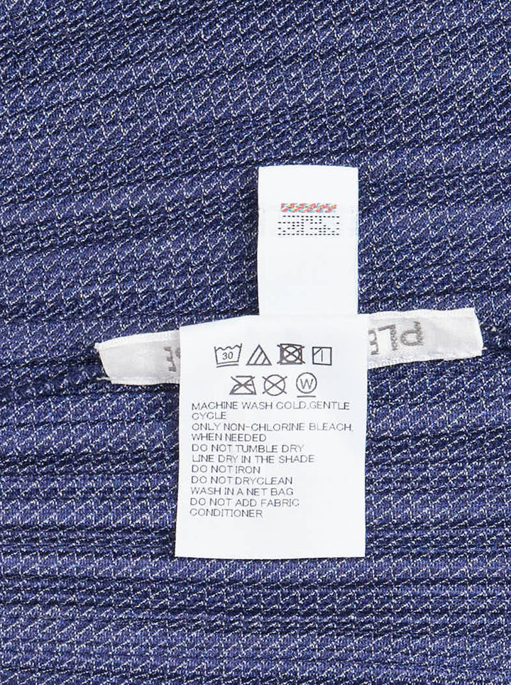 Pleats Please Issey Miyake Cotton Denim blouson in indigo blue with pleated texture, pointed collar, button front and darker shoulder panels - view 3