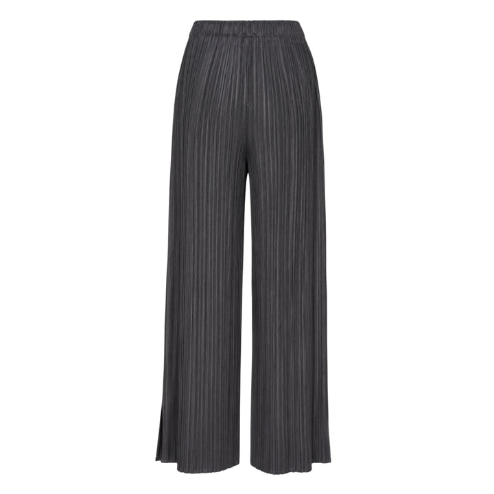 Pleats Please Issey Miyake Monthly Colors August wide-leg micro-pleated trousers in warm cream with elasticated waist