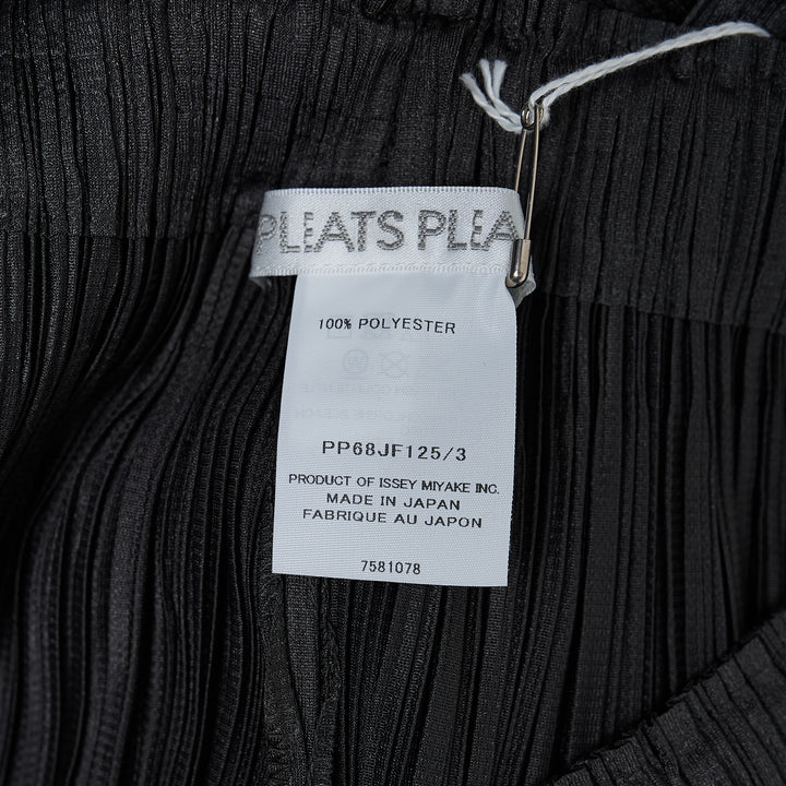 Pleats Please Issey Miyake Monthly Colors August wide-leg micro-pleated trousers in warm cream with elasticated waist