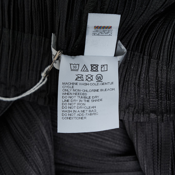 Pleats Please Issey Miyake Monthly Colors August wide-leg micro-pleated trousers in warm cream with elasticated waist