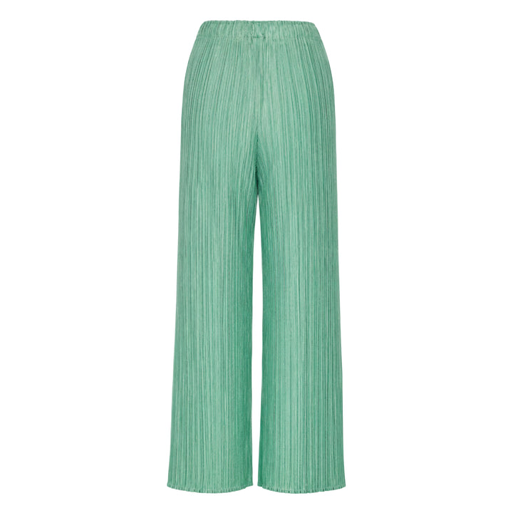 Pleats Please Issey Miyake Monthly Colors August wide-leg micro-pleated trousers in warm cream with elasticated waist