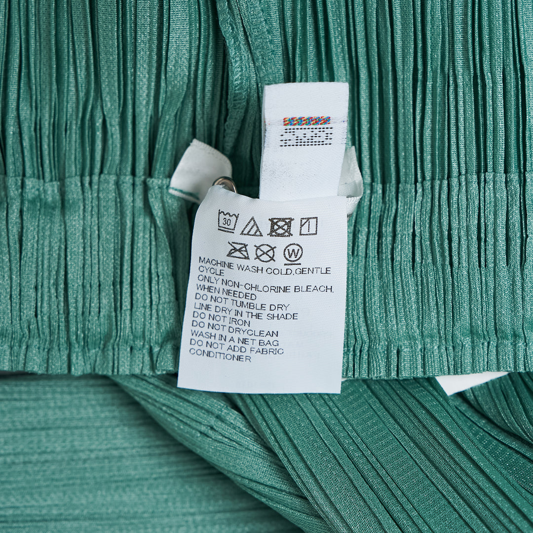 Pleats Please Issey Miyake Monthly Colors August wide-leg micro-pleated trousers in warm cream with elasticated waist