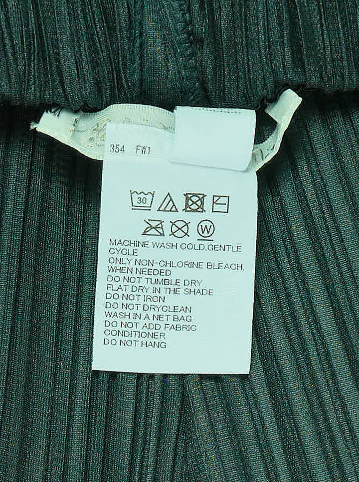 Pleats Please Issey Miyake Monthly Colors October pleated flared pants in deep green with sculpted side panels and elasticated waist - view 3