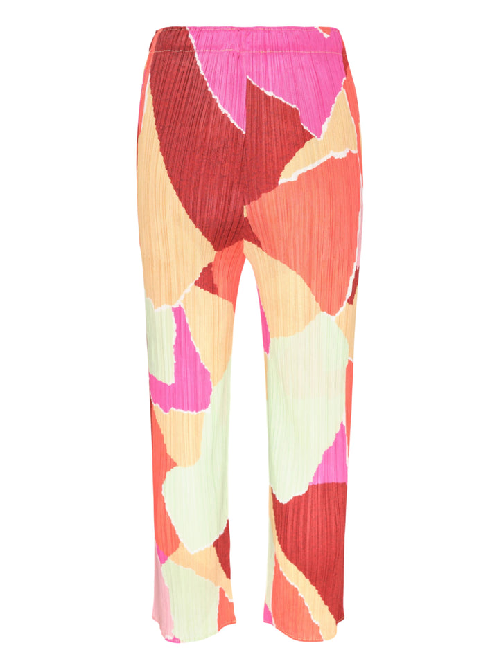 Pleats Please Issey Miyake SURPRISE! Pants in abstract multicolour geometric print featuring fuchsia, burgundy, coral, peach, and sage on permanent-pleat fabric with a straight-leg silhouette - view 2
