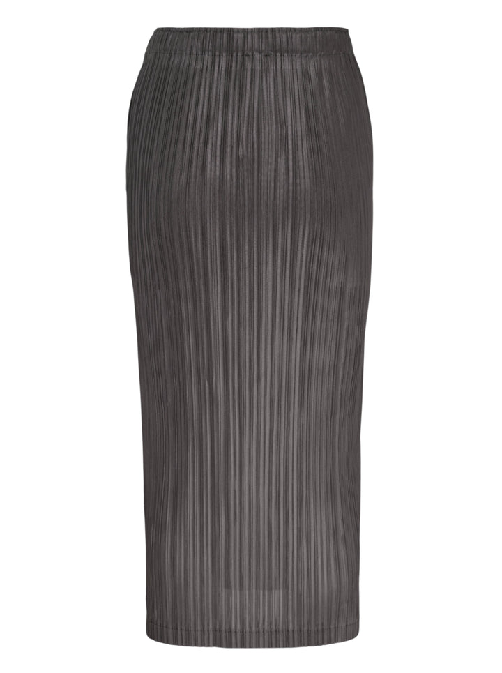 Pleats Please Issey Miyake Thicker Bottoms 2 pleated midi skirt in dark charcoal grey with vertical permanent pleating and elasticated waistband - view 2