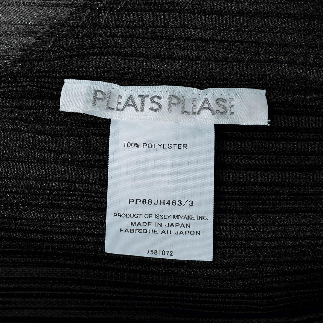 Pleats Please Issey Miyake TWIRL midi dress in black micro-pleated fabric with diagonal silver fringe stripe bands spiralling across the body