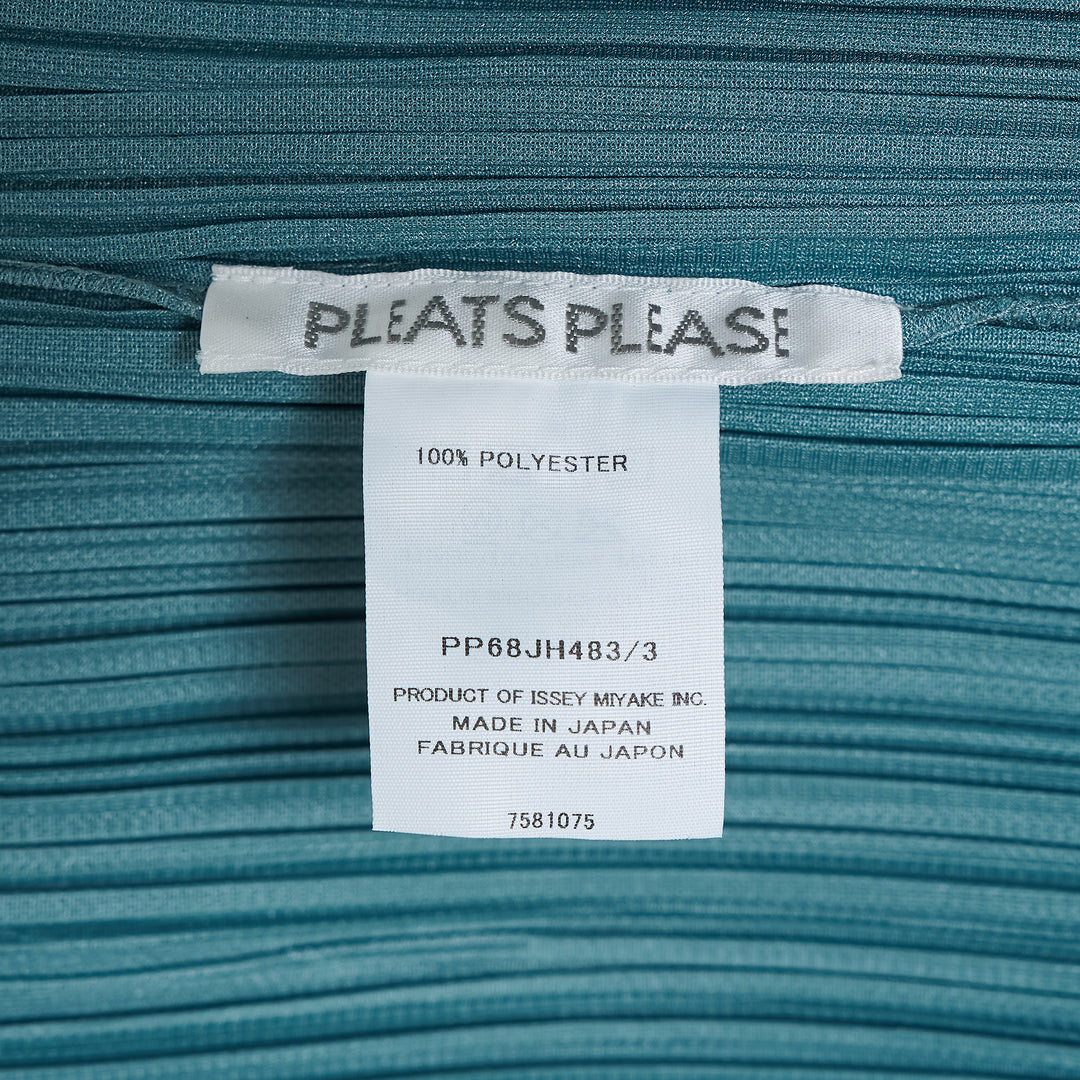 Pleats Please Issey Miyake Fold Dress in teal, featuring directionally engineered permanent pleats, sleeveless silhouette, wide square neckline, and asymmetric maxi hem