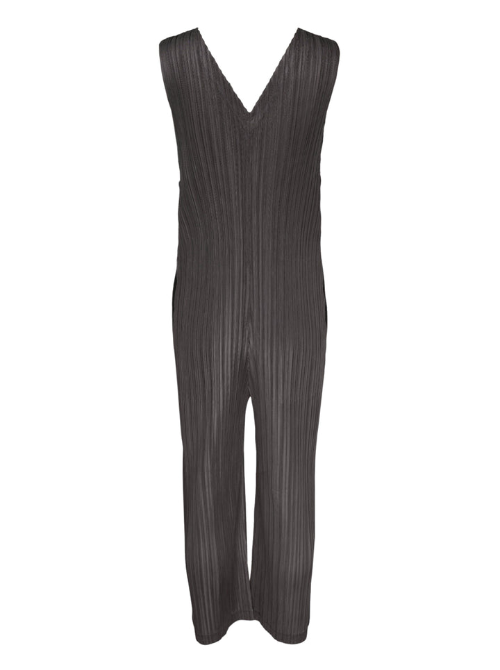 Pleats Please Issey Miyake Thicker Bottoms 2 Jumpsuit in charcoal, featuring a sleeveless V-neck with tonal lace trim, permanent-pleat fabric, and a relaxed wide-leg silhouette - view 2