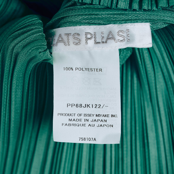 Pleats Please Issey Miyake Monthly Colors August short sleeve top in charcoal grey, featuring all-over permanent pleating, a V-neckline, and a fitted silhouette