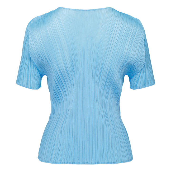 Pleats Please Issey Miyake Monthly Colors August short sleeve top in charcoal grey, featuring all-over permanent pleating, a V-neckline, and a fitted silhouette