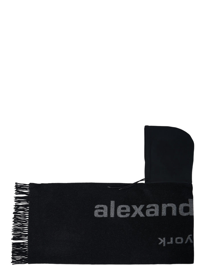 Alexander Wang black hooded logo scarf with grey jacquard branding, drawstring hood and fringed ends