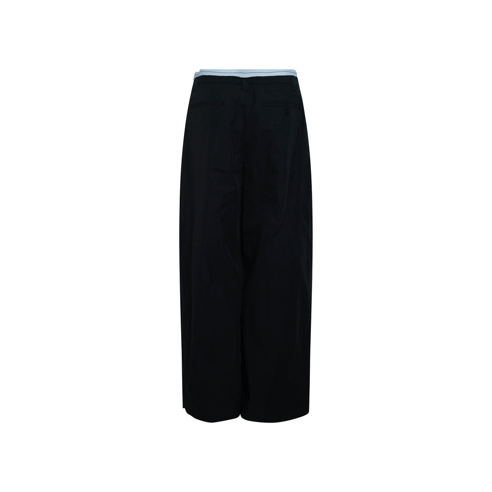 Alexander Wang high-rise wide-leg tailored pants in black with pale blue logo elastic waistband, front view on white background - view 2