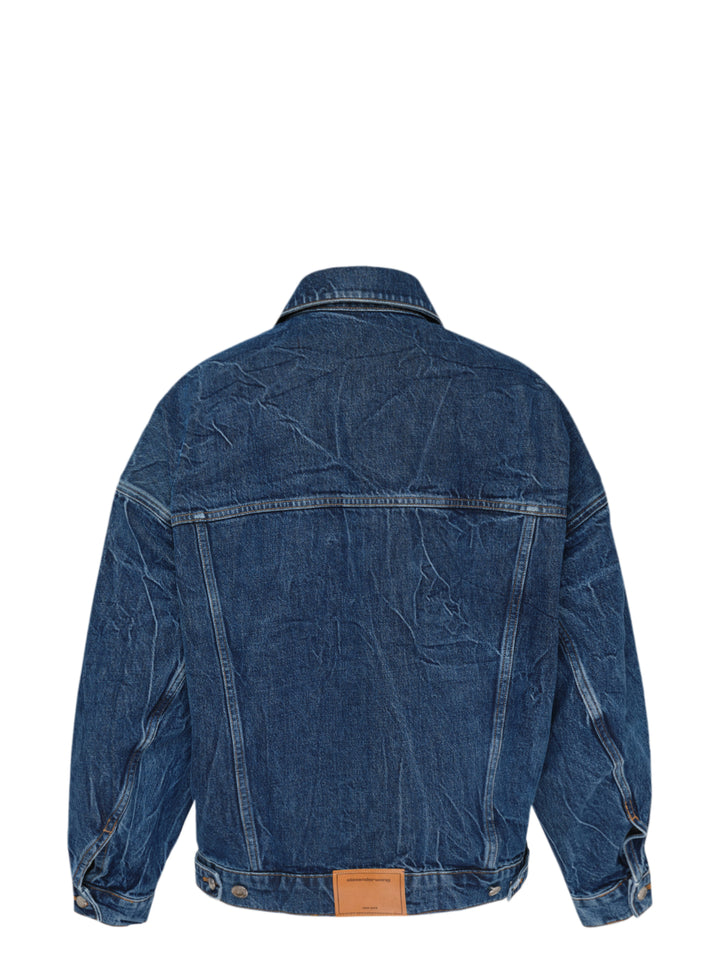 Alexander Wang oversized trucker jacket in washed blue denim with chest flap pockets, button front and AW logo tape on the sleeve - view 2