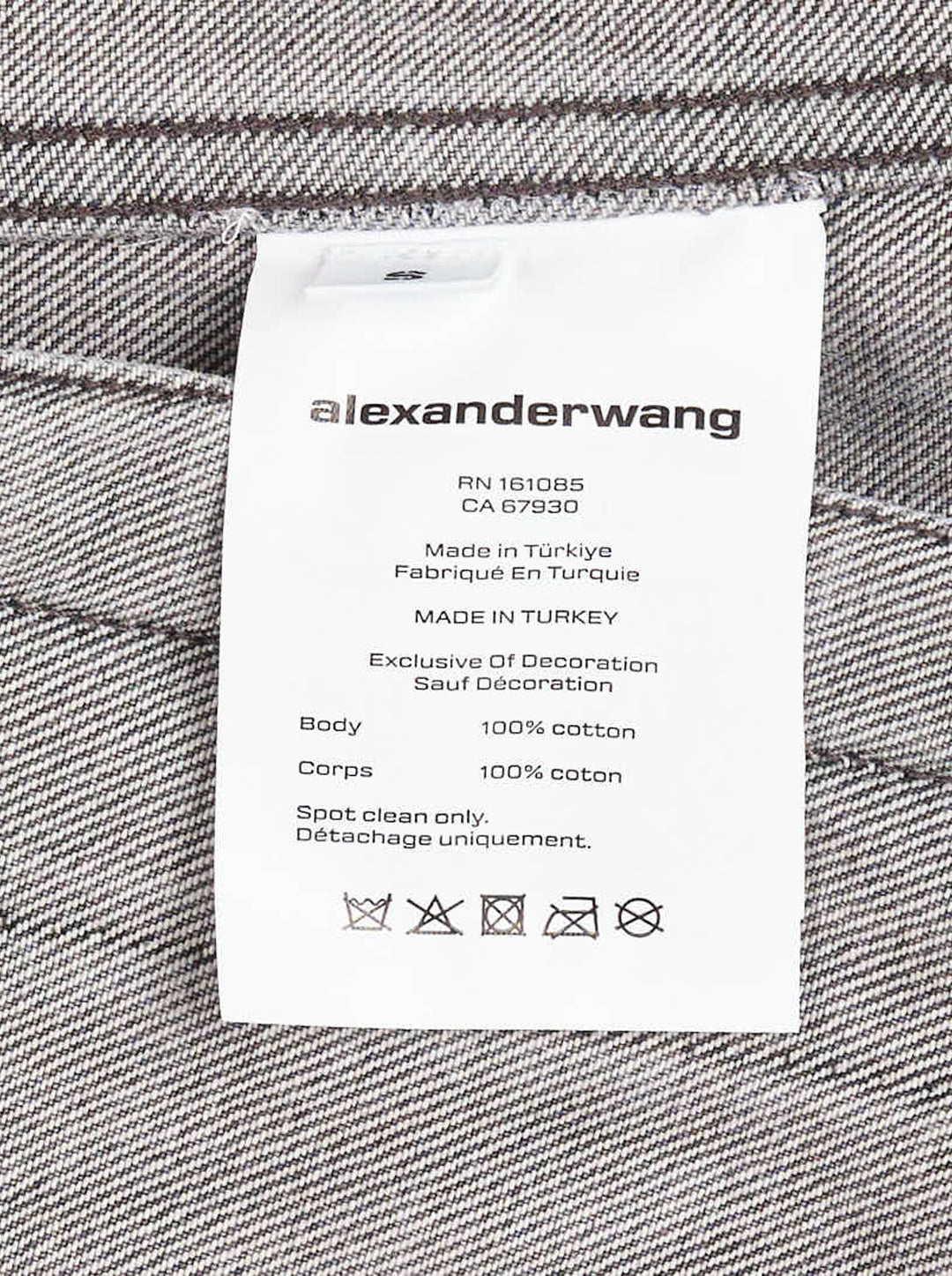 Alexander Wang oversized trucker jacket in washed grey denim with AW logo detail on the sleeve and woven denim label at the hem - view 6