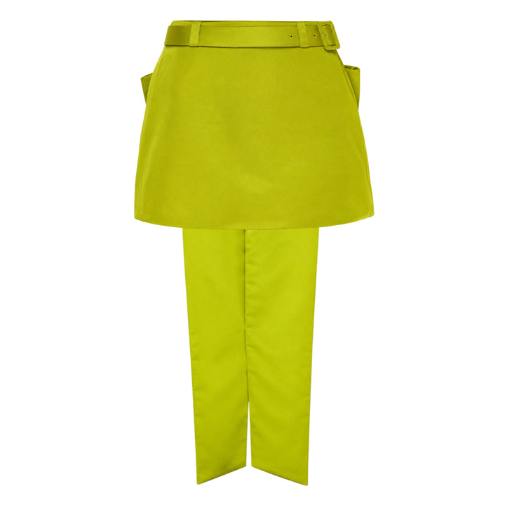 Self-Portrait lime green belted mini skirt over straight-leg trousers hybrid garment, laid flat on a white background, featuring a self-covered buckle belt and smooth satin-finish fabric